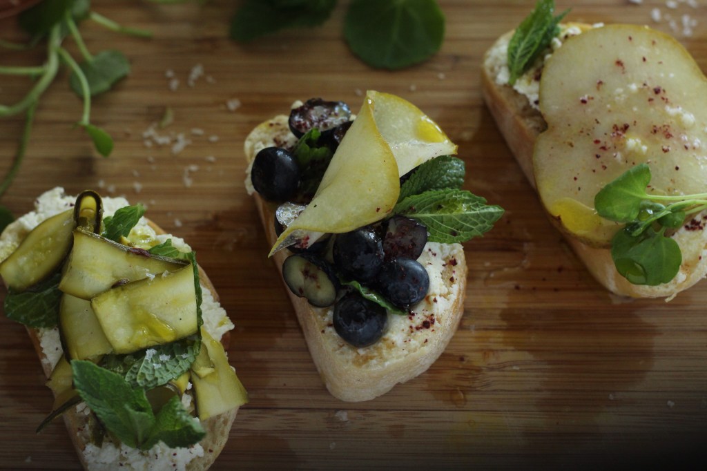 Ricotta on crusty bread with pickled Courgette and Pear. 